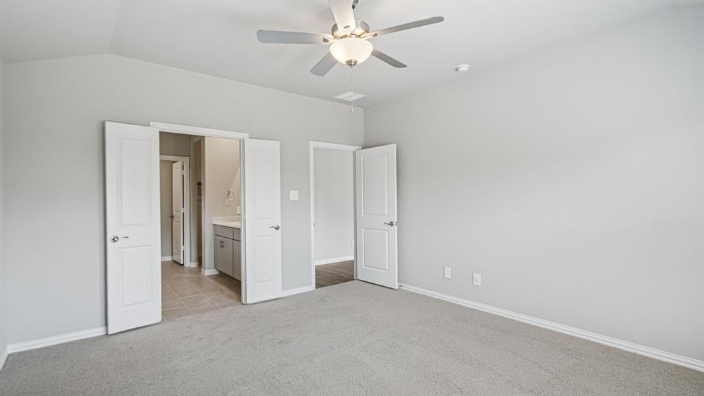 2120 Rannoch Street Sherman, TX 75092 - Photo 29 of 36 an empty room with closet and a ceiling fan