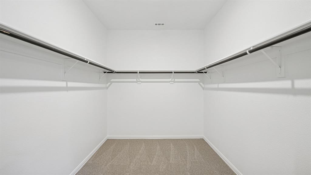 2120 Rannoch Street Sherman, TX 75092 - Photo 34 of 36 a view of a room with racks on the wall