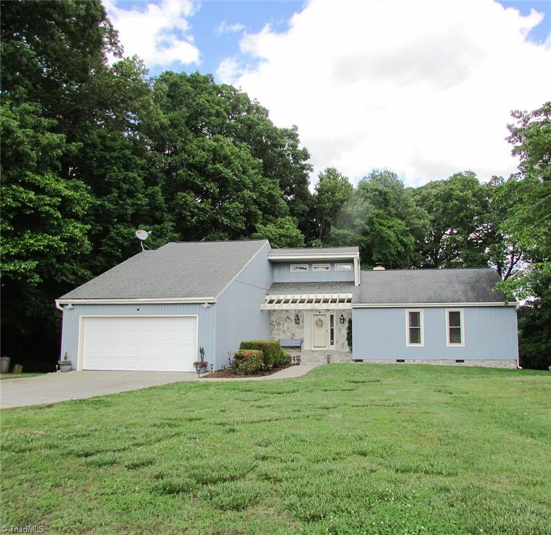 1612 Penny Road High Point, NC 27265 - Photo 2 of 46 Contemporary Exterior With Rock Front Entry & Pergola
