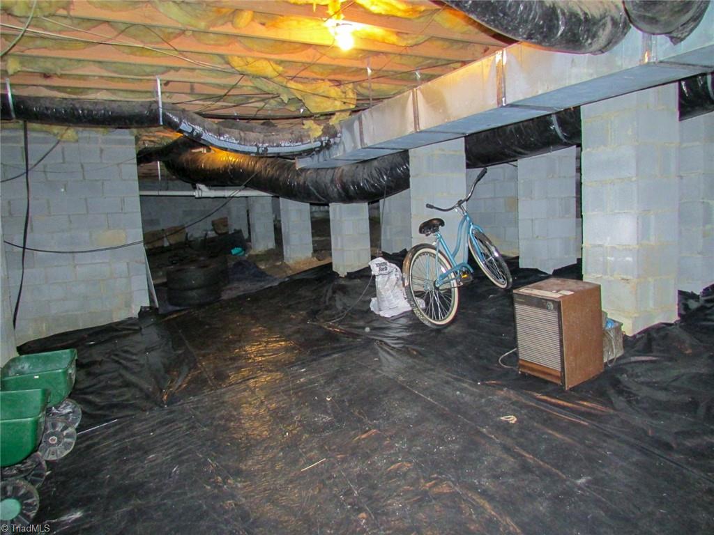 1612 Penny Road High Point, NC 27265 - Photo 34 of 46 Walk-In Crawlspace Offers Extra Covered Storage