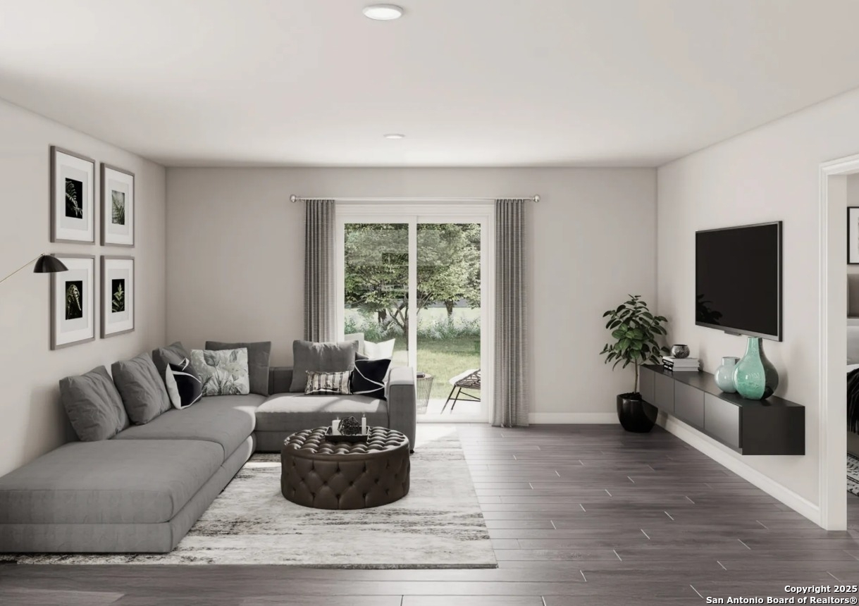 505 Sendera Way Kenedy, TX 78119 - Photo 3 of 5 a living room with furniture potted plant and a window