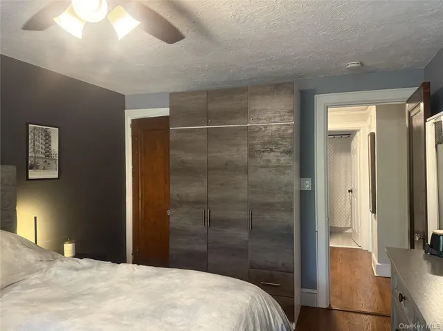 a bedroom with a bed and a view of bathroom