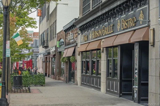 a view of a street with cars