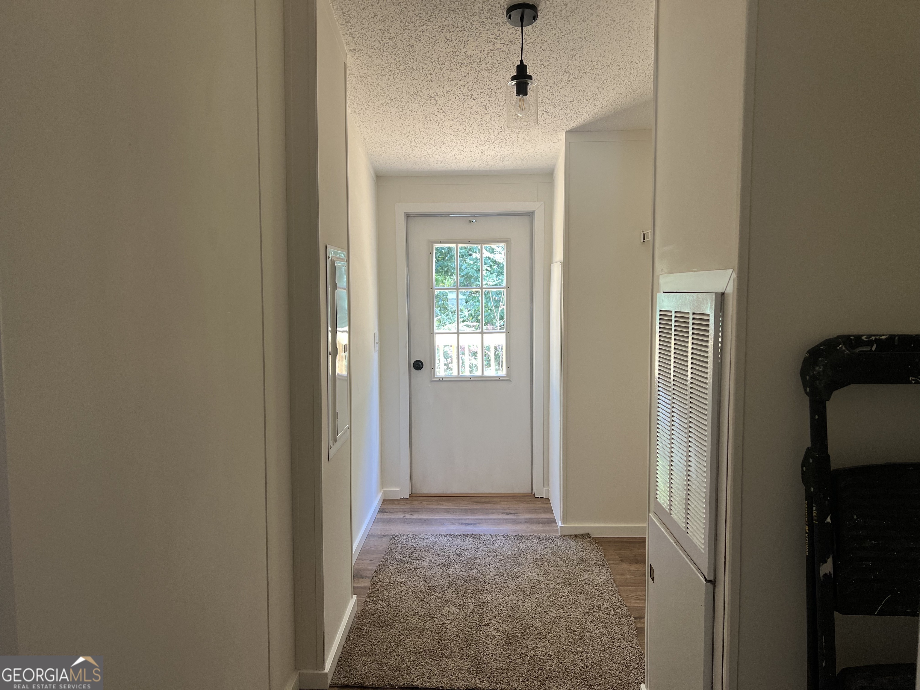 178 Edna Circle Thomaston, GA 30286 - Photo 19 of 31 a view of hallway with closet and wooden floor