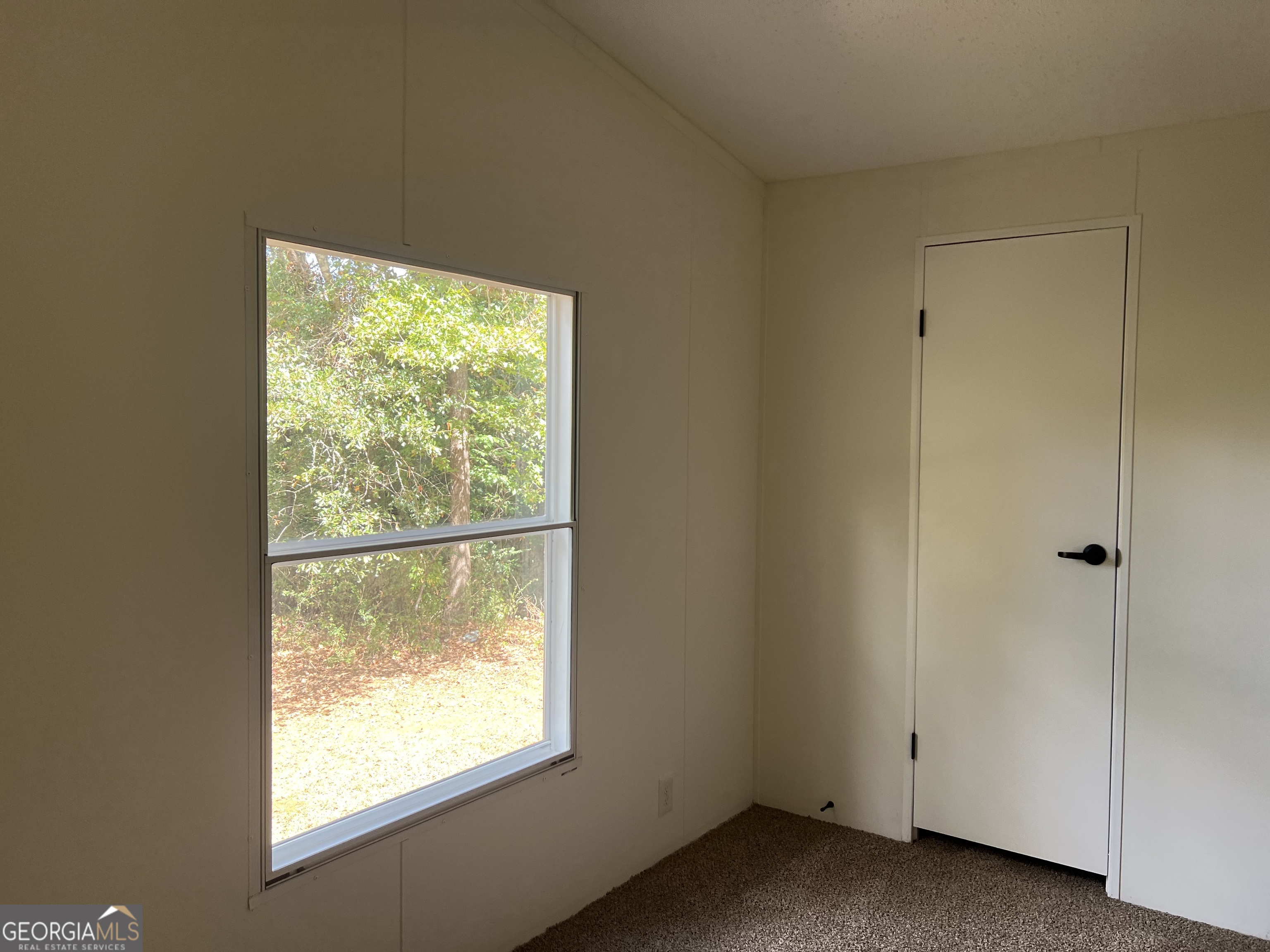 178 Edna Circle Thomaston, GA 30286 - Photo 26 of 31 a view of an empty room with a window