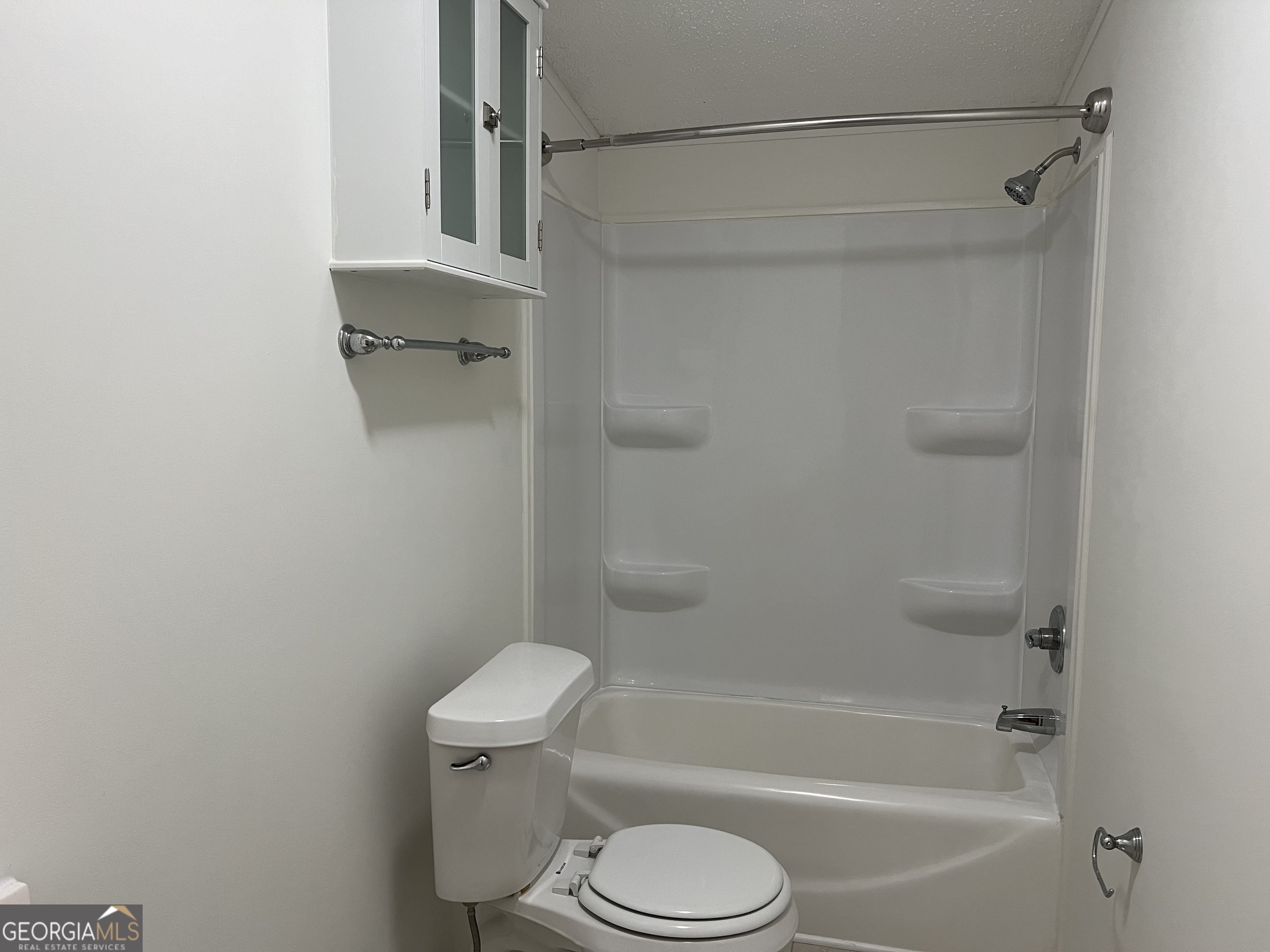 178 Edna Circle Thomaston, GA 30286 - Photo 30 of 31 a bathroom with a shower and a toilet