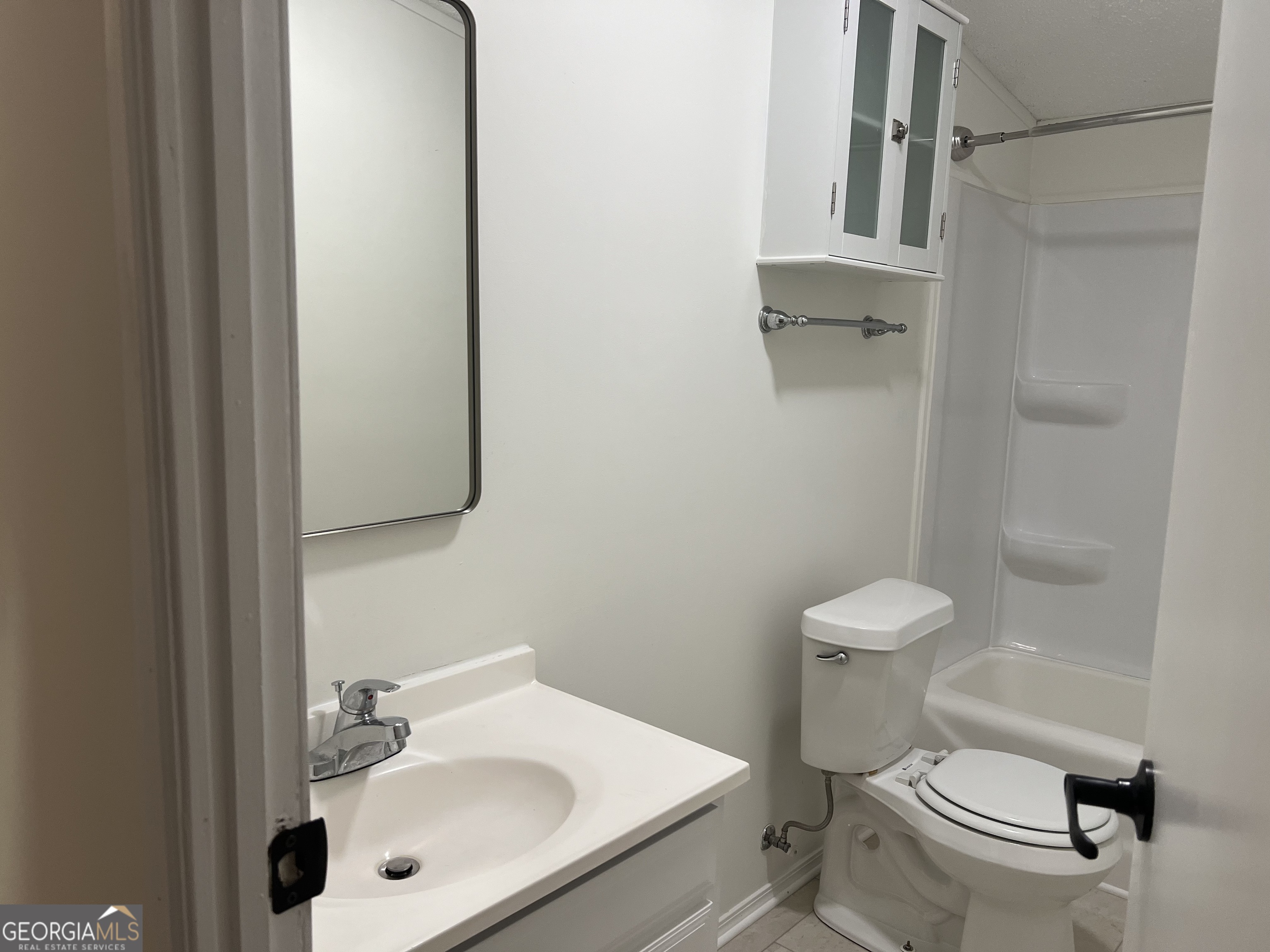 178 Edna Circle Thomaston, GA 30286 - Photo 31 of 31 a white toilet sitting next to a bathroom sink