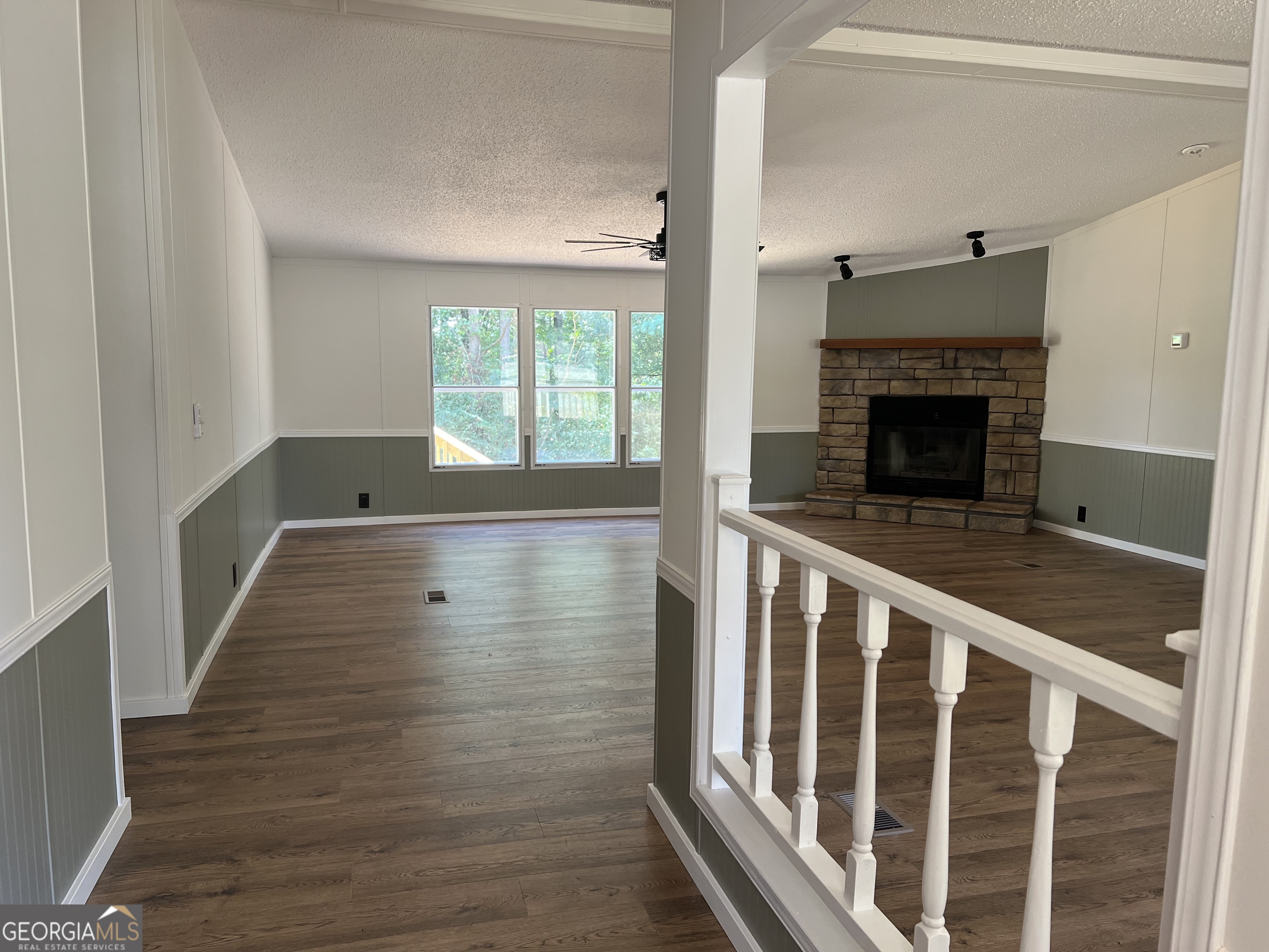 178 Edna Circle Thomaston, GA 30286 - Photo 6 of 31 a view of wooden floor and a fireplace in a room