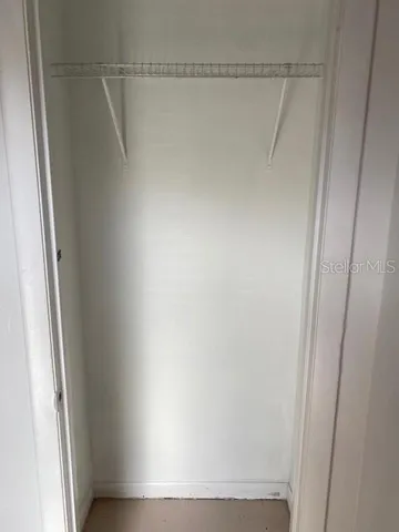 a view of a car parked in front of a house