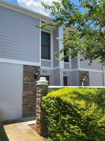 a house view with a outdoor space