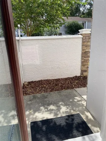 a view of a back yard of a house