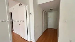 a view of a bathroom with a glass door