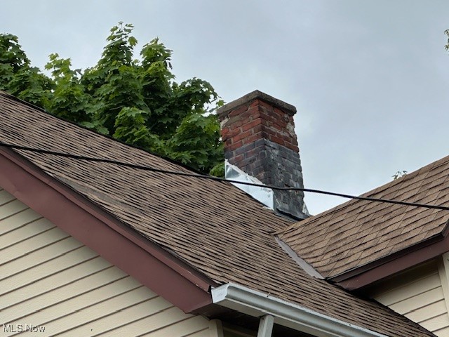 973 Stevenson Road Cleveland, OH 44110 - Photo 25 of 25 Exterior view of a shingled roof