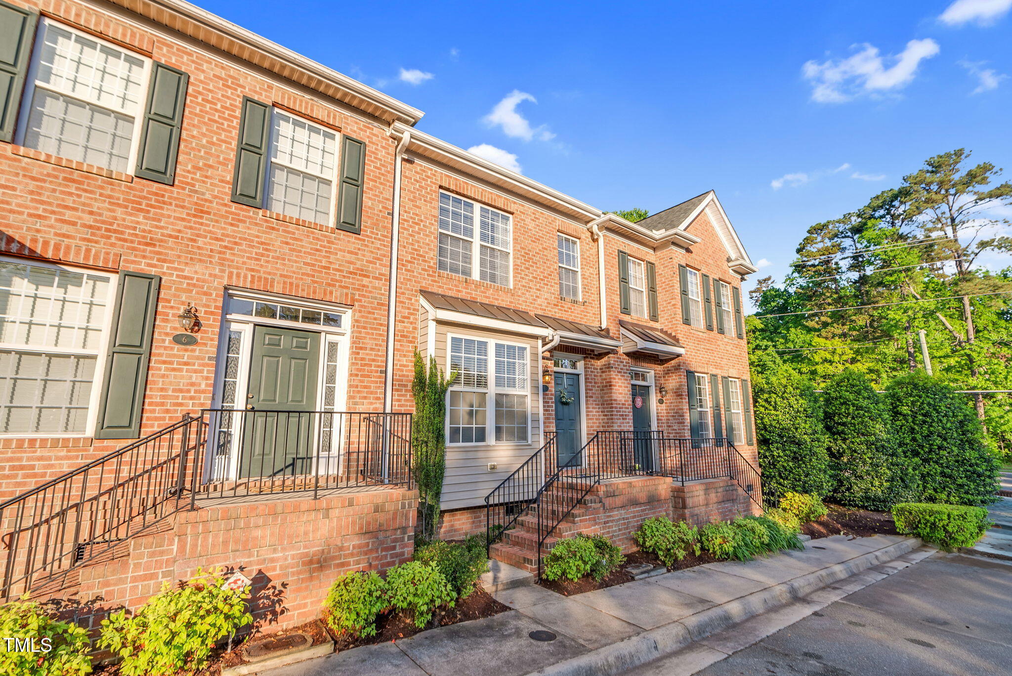 4 Scottish Lane Durham, NC 27707 - Photo 2 of 49 a front view of a house with a yard