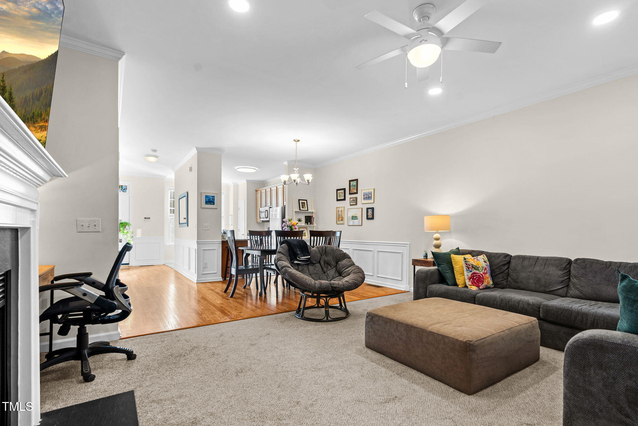 4 Scottish Lane Durham, NC 27707 - Photo 22 of 49 a living room with furniture and a chandelier