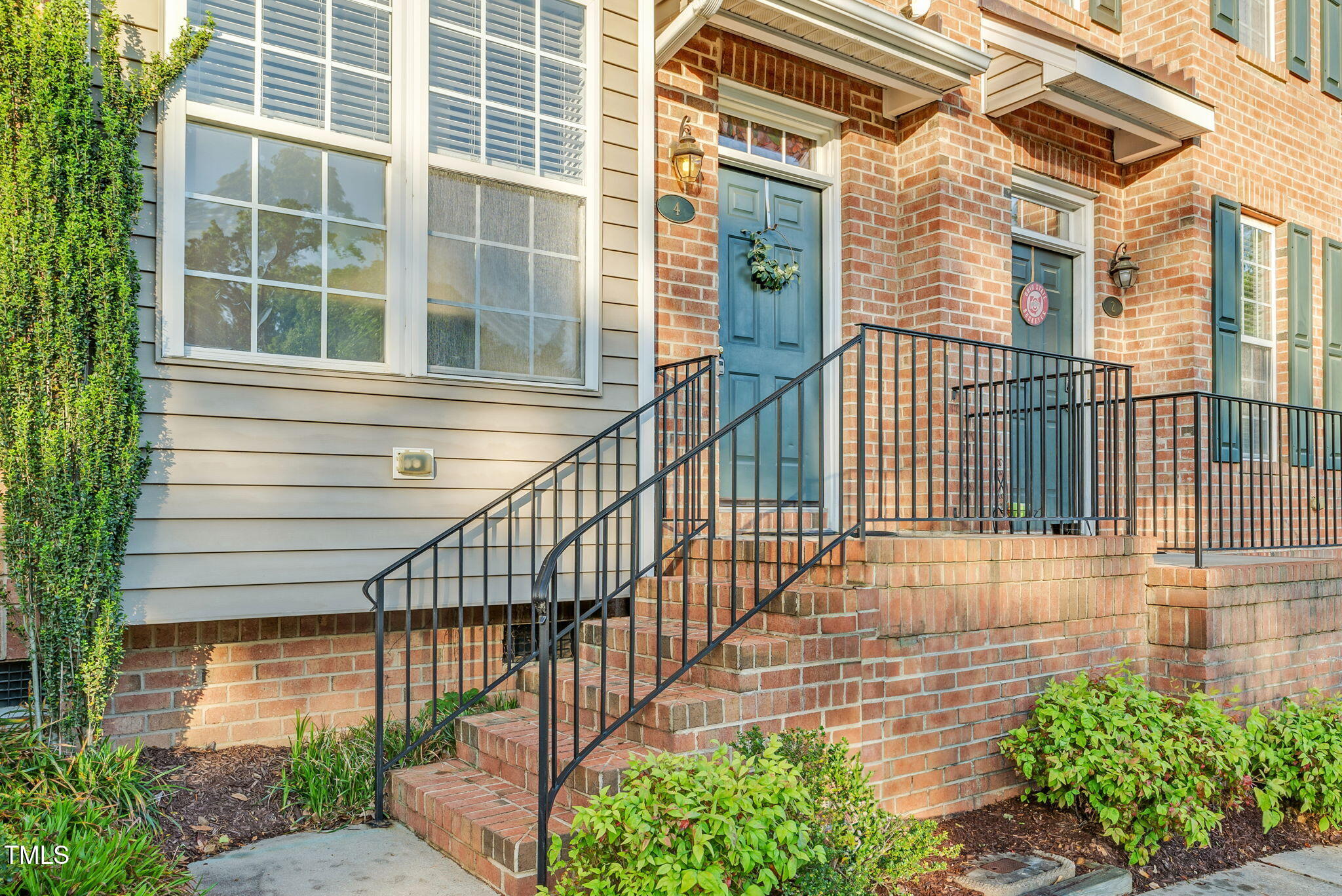 4 Scottish Lane Durham, NC 27707 - Photo 3 of 49 a view of a house with a window and wooden floor