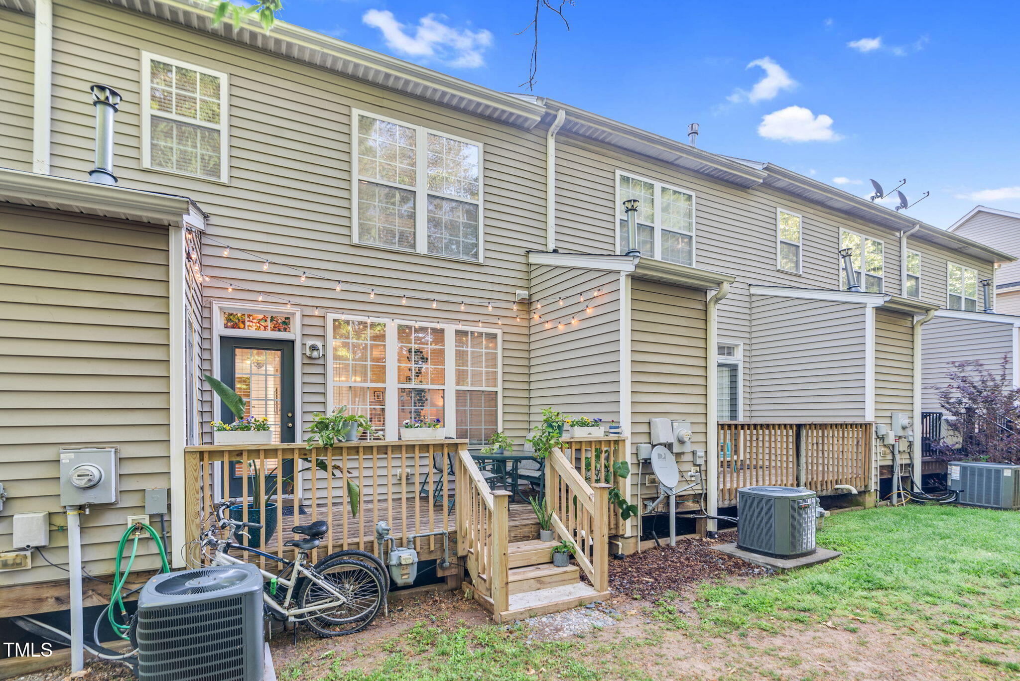 4 Scottish Lane Durham, NC 27707 - Photo 45 of 49 a view of backyard with a chair and potted plants