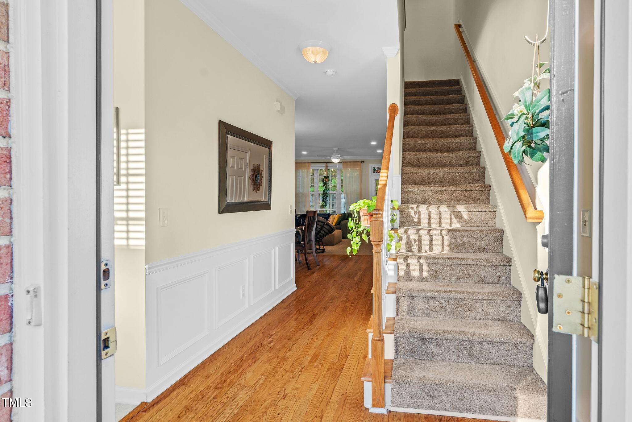 4 Scottish Lane Durham, NC 27707 - Photo 5 of 49 a view of an entryway with wooden floor and stairs