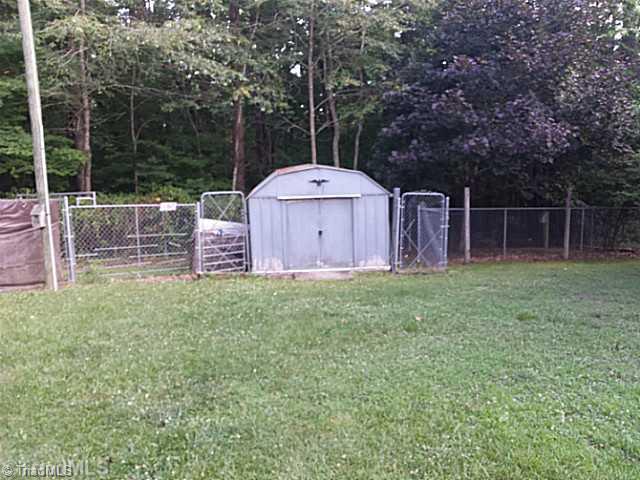 2462 Steele Road Sandy Ridge, NC 27046 - Photo 8 of 10 Storage. storage and fencing for animals