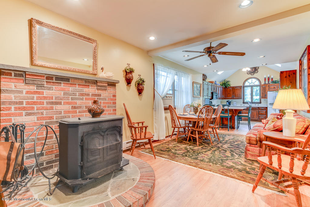 125 Colts Neck Road Farmingdale, NJ 07727 - Photo 5 of 17 a living room filled with furniture