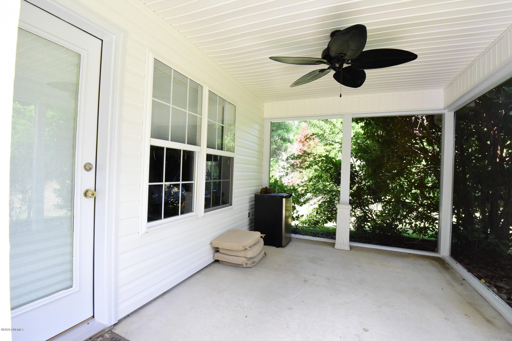 170 Brickyard Point Road South Beaufort, SC 29907 - Photo 15 of 38 Screened porch off of Master Bedroom
