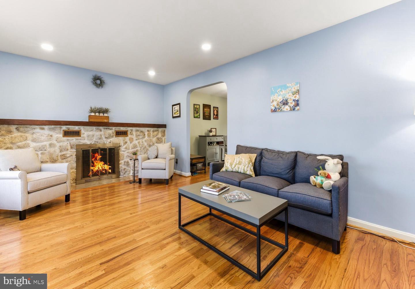 656 East Greenman Road Haddonfield, NJ 08033 - Photo 3 of 22 a living room with furniture and a fireplace