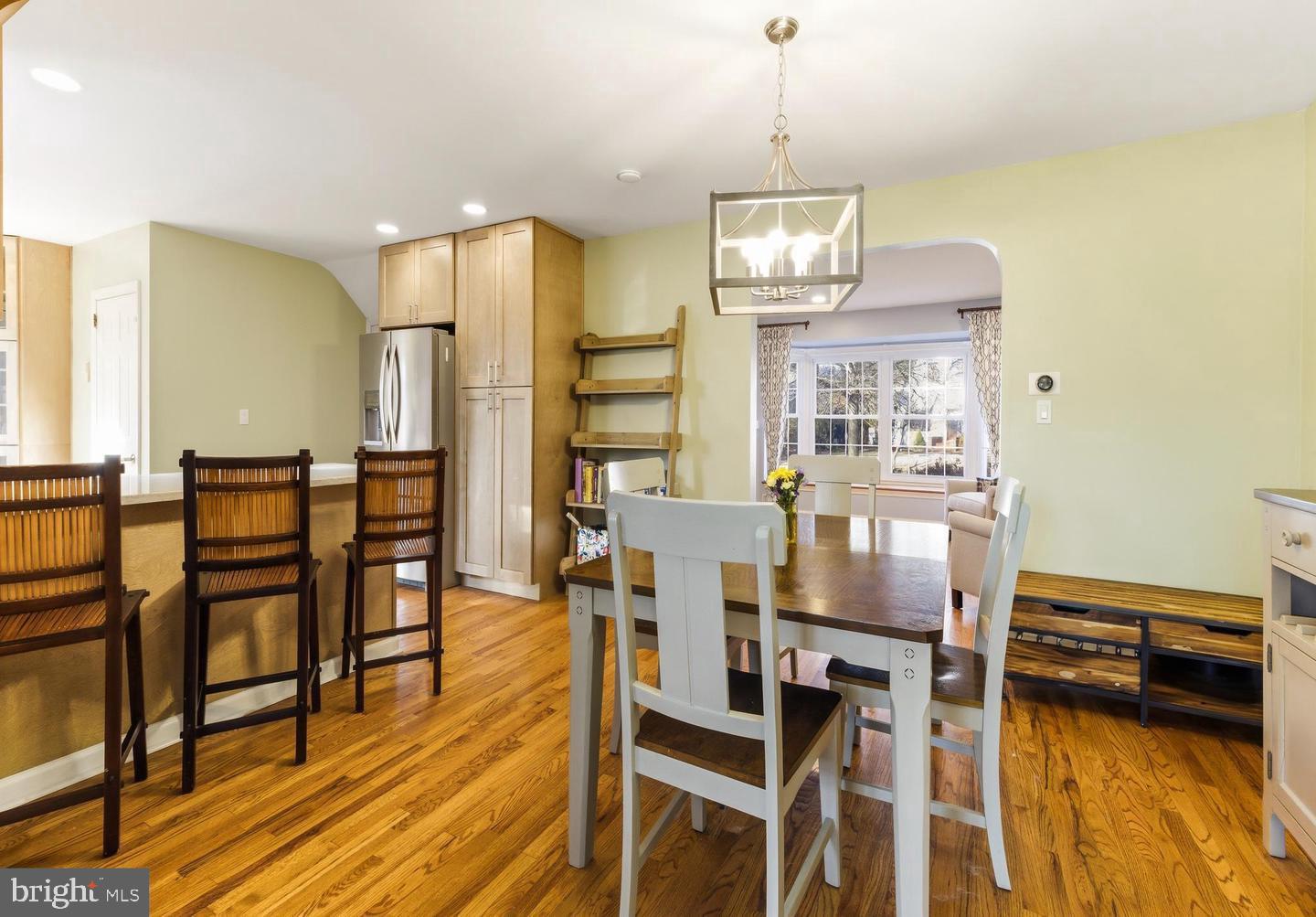 656 East Greenman Road Haddonfield, NJ 08033 - Photo 7 of 22 a view of a dining room with furniture and wooden floor