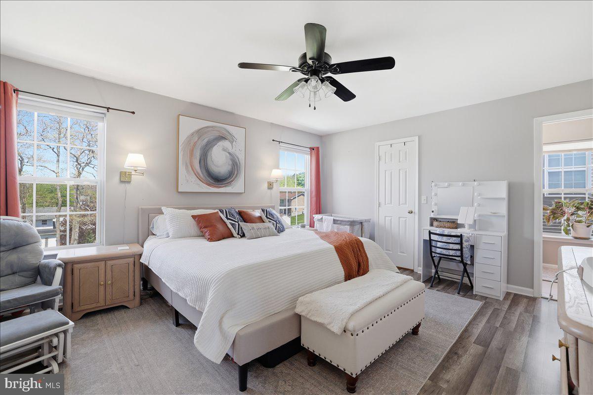 215 Birch Street Walnutport, PA 18088 - Photo 28 of 48 a bedroom with a bed and wooden floor