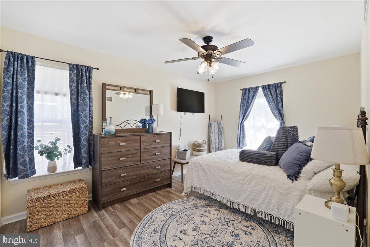 215 Birch Street Walnutport, PA 18088 - Photo 36 of 48 a bedroom with a bed and wooden floor