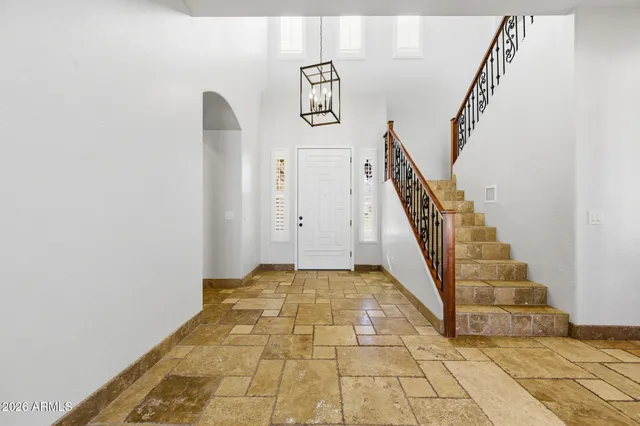 a bathroom with a double vanity sink and mirror