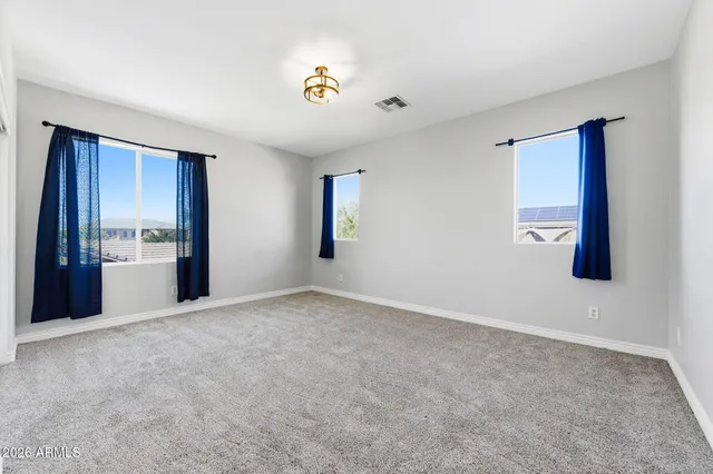 an aerial view of a house with garden space and sitting space