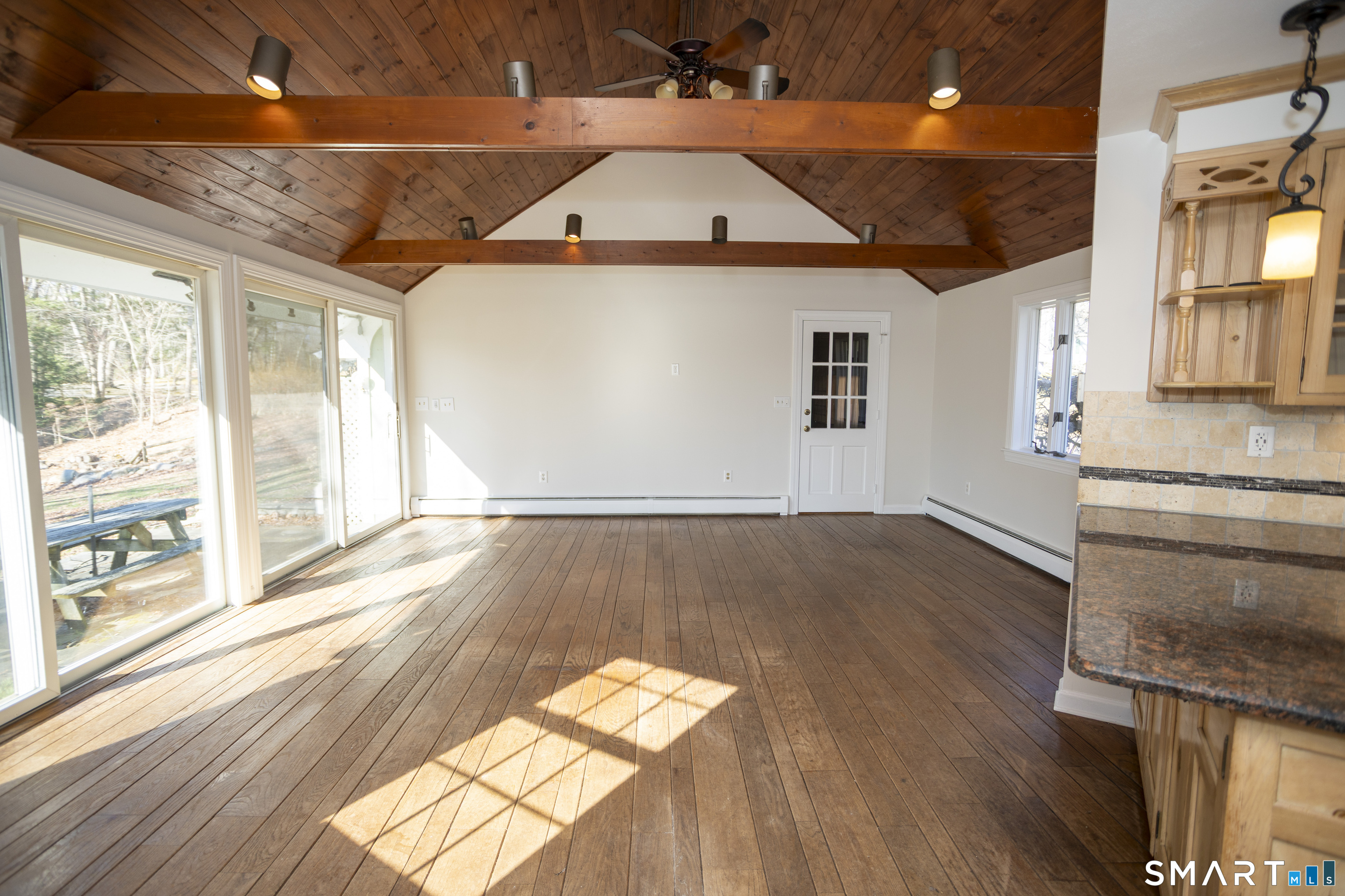 10 Cove Hill Road Essex, CT 06426 - Photo 15 of 38 wooden floor in an empty room with a window