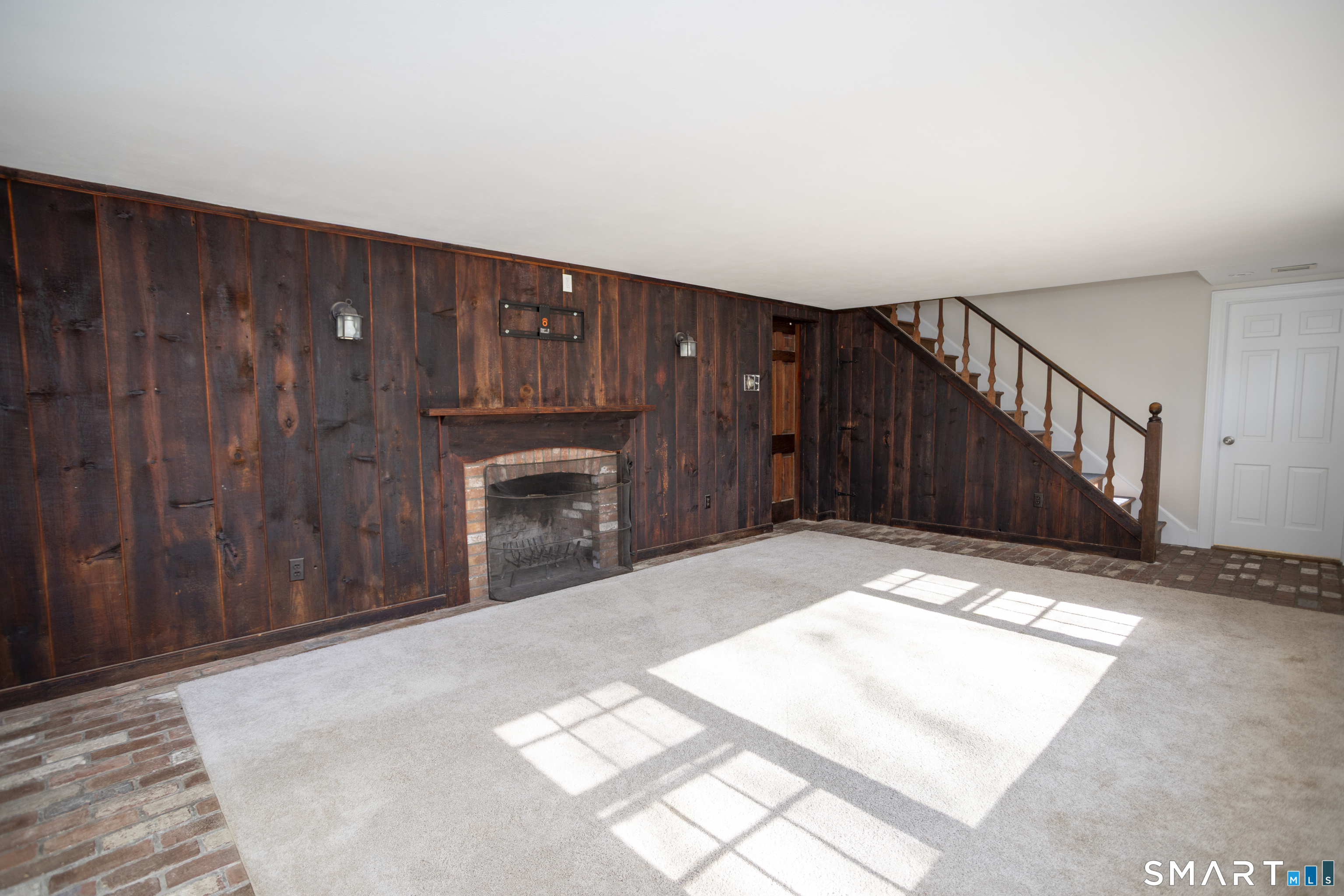 10 Cove Hill Road Essex, CT 06426 - Photo 23 of 38 a view of an empty room with wooden floor