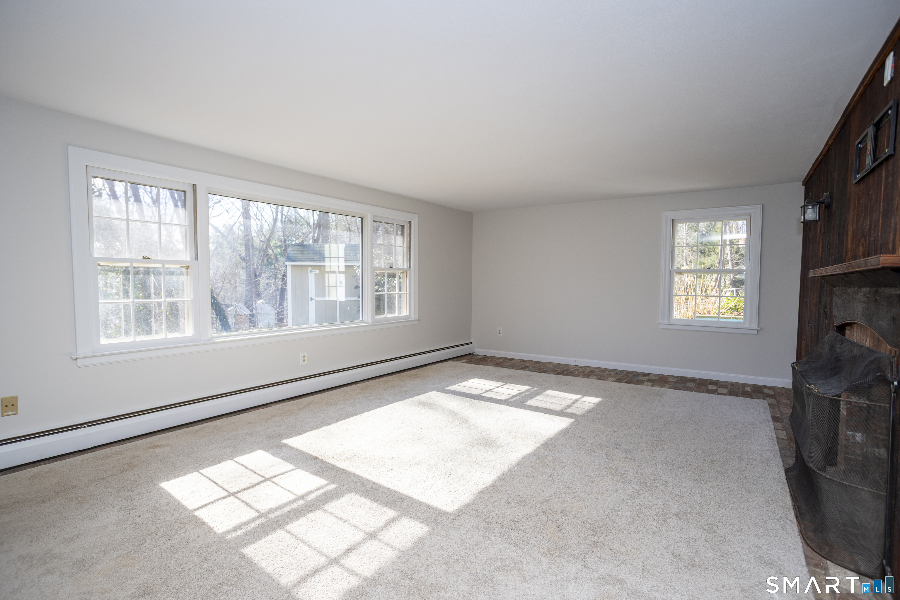 10 Cove Hill Road Essex, CT 06426 - Photo 24 of 38 a view of an empty room and a window