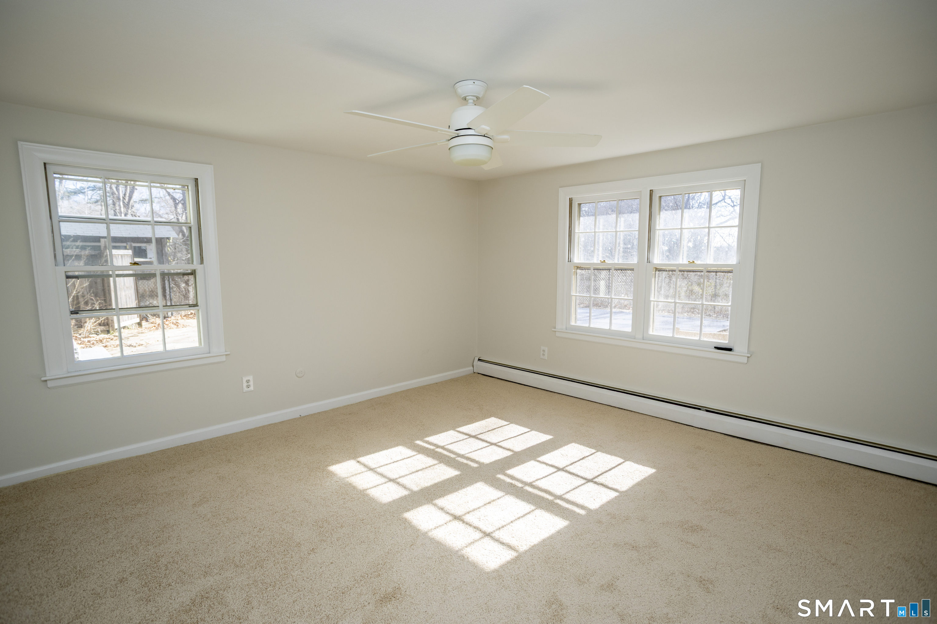 10 Cove Hill Road Essex, CT 06426 - Photo 25 of 38 a view of an empty room with a window