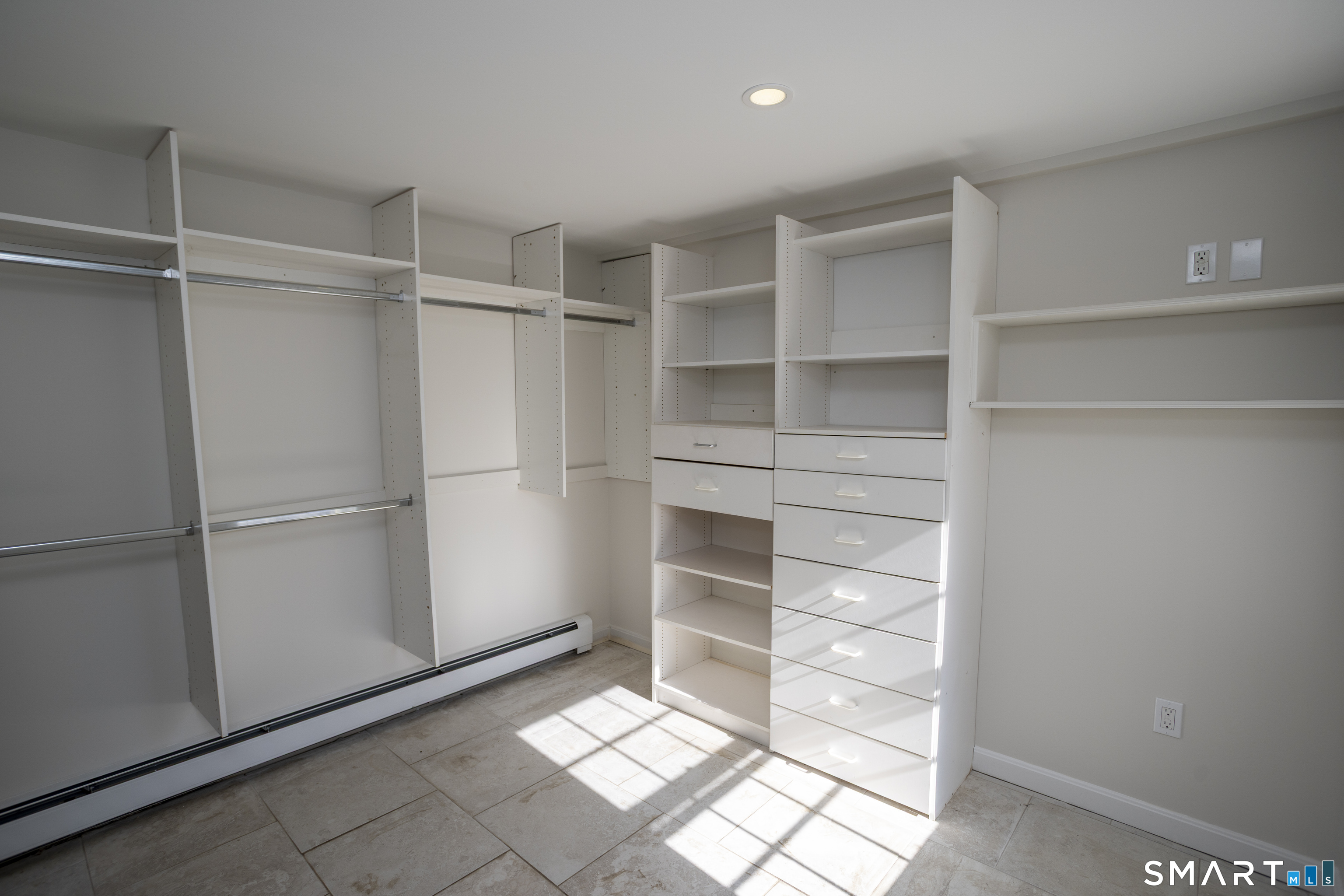 10 Cove Hill Road Essex, CT 06426 - Photo 29 of 38 a view of an empty walk in closet