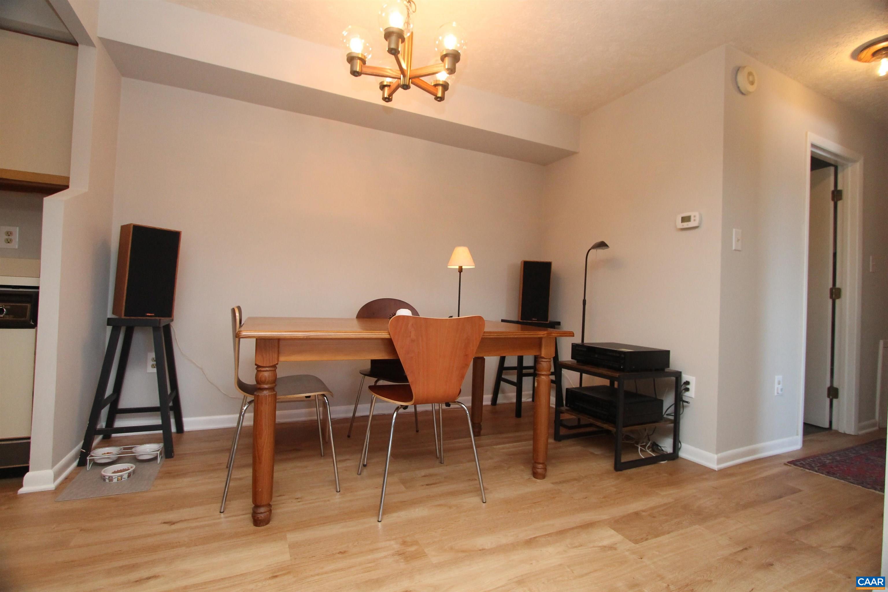 130 Turtle Creek Road, Unit 2 Charlottesville, VA 22901 - Photo 5 of 10 a view of a dining room with furniture