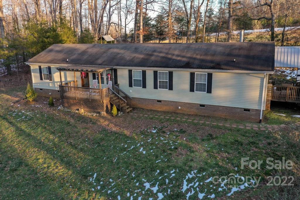 890 Rock Road Rutherfordton, NC 28139 - Photo 1 of 40 a aerial view of a house with a yard