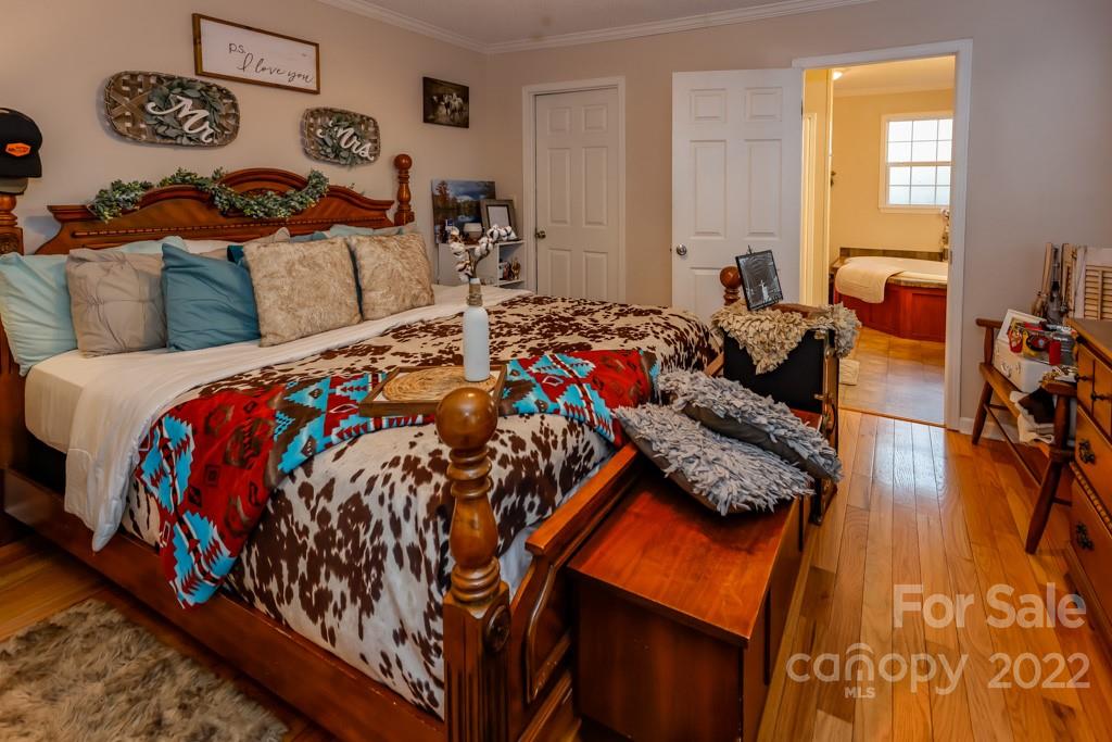 890 Rock Road Rutherfordton, NC 28139 - Photo 17 of 40 a bed room with a bed and a couch