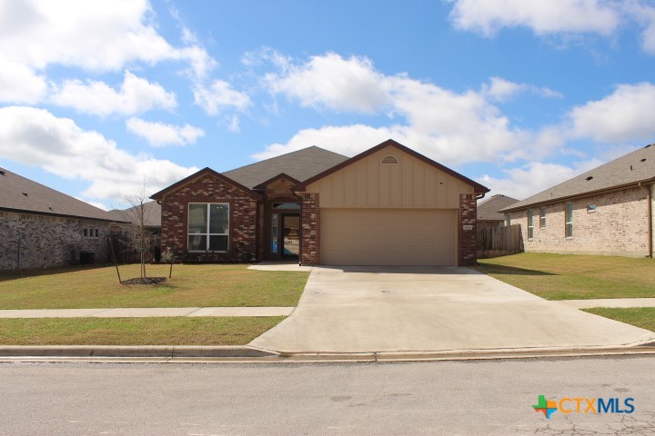 3006 Hedwig Street Killeen, TX 76549 - Photo 1 of 14 a view of swimming pool with big yard and large tree