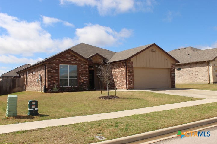 3006 Hedwig Street Killeen, TX 76549 - Photo 2 of 14 a front view of a house with a yard