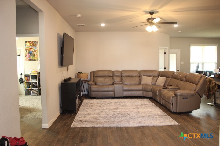 3006 Hedwig Street Killeen, TX 76549 - Photo 5 of 14 a living room with furniture and a flat screen tv