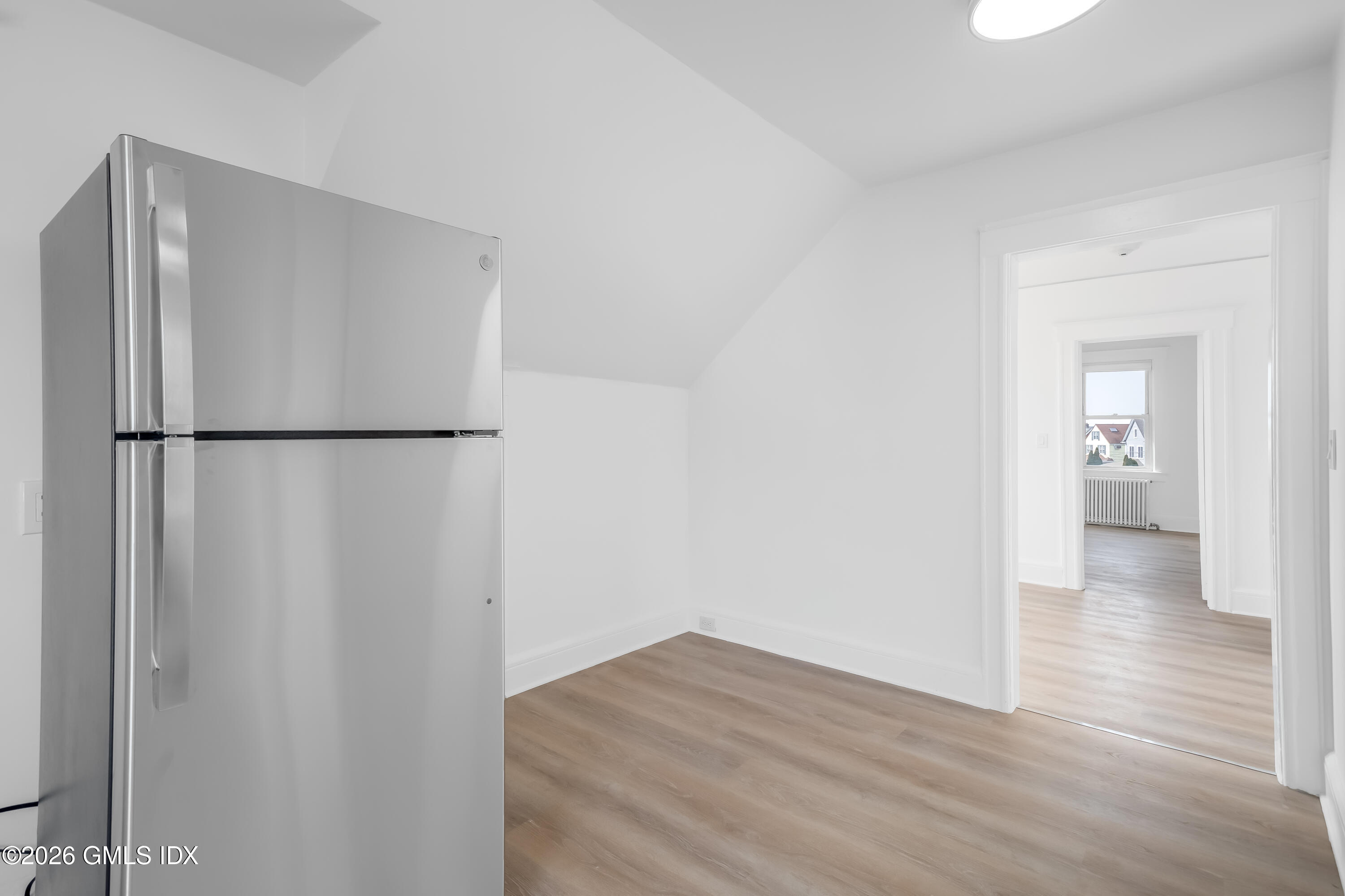 140 Hamilton Avenue, Unit 3 Greenwich, CT 06830 - Photo 3 of 11 a view of wooden floor in a kitchen
