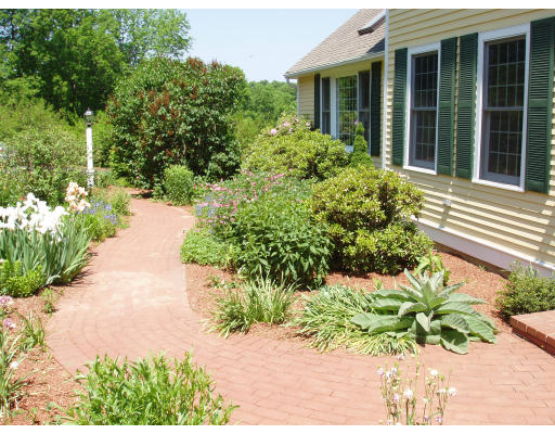 85 Summer Street Wrentham, MA 02093 - Photo 3 of 9 a view of a house with potted plants