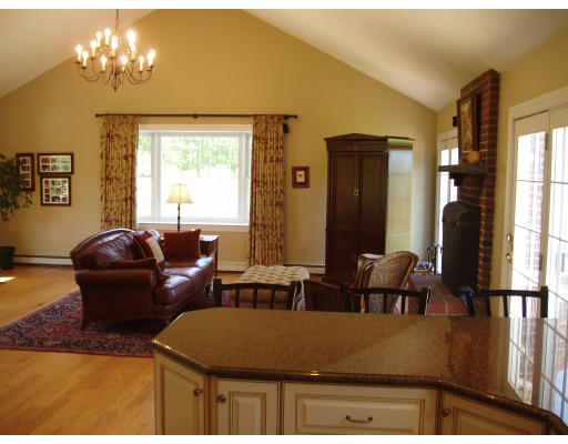 85 Summer Street Wrentham, MA 02093 - Photo 5 of 9 a living room with furniture chandelier and a window