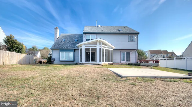 a view of swimming pool with a lounge chair