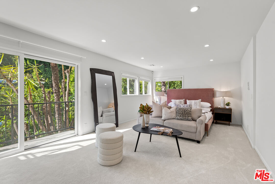 7229 Senalda Road Los Angeles, CA 90068 - Photo 16 of 24 a living room with furniture and a potted plant