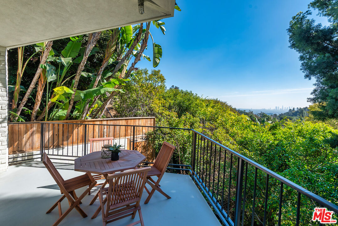 7229 Senalda Road Los Angeles, CA 90068 - Photo 4 of 24 a view of balcony with furniture and outdoor space