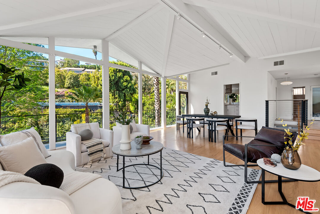 7229 Senalda Road Los Angeles, CA 90068 - Photo 5 of 24 a living room with furniture and a large window