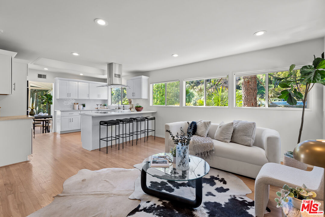 7229 Senalda Road Los Angeles, CA 90068 - Photo 10 of 24 a living room with furniture and a large window